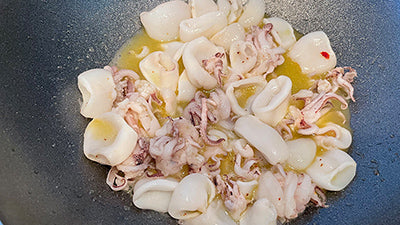 STROZZAPRETI, SQUID, DATTERINO TOMATOES, ZUCCHINI FLOWERS.