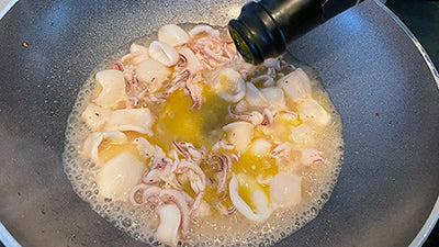 STROZZAPRETI, SQUID, DATTERINO TOMATOES, ZUCCHINI FLOWERS.