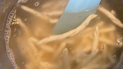 STROZZAPRETI, SQUID, DATTERINO TOMATOES, ZUCCHINI FLOWERS.