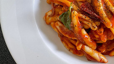 Raschiatelli S. Cappelli con moscardini e sugo piccante