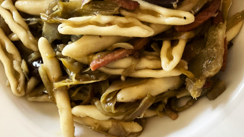 Strozzapreti carciofi, speck e olive