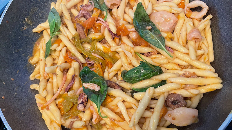 STROZZAPRETI, SQUID, DATTERINO TOMATOES, ZUCCHINI FLOWERS.