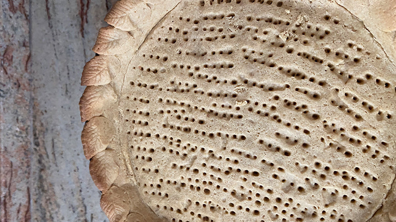 Cuocere la frolla al farro e limone.