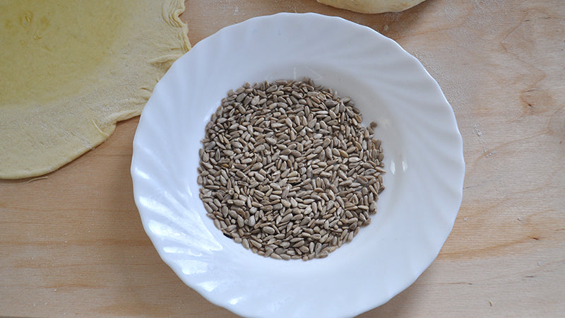 i semi sia sulla parte spennellata d’olio